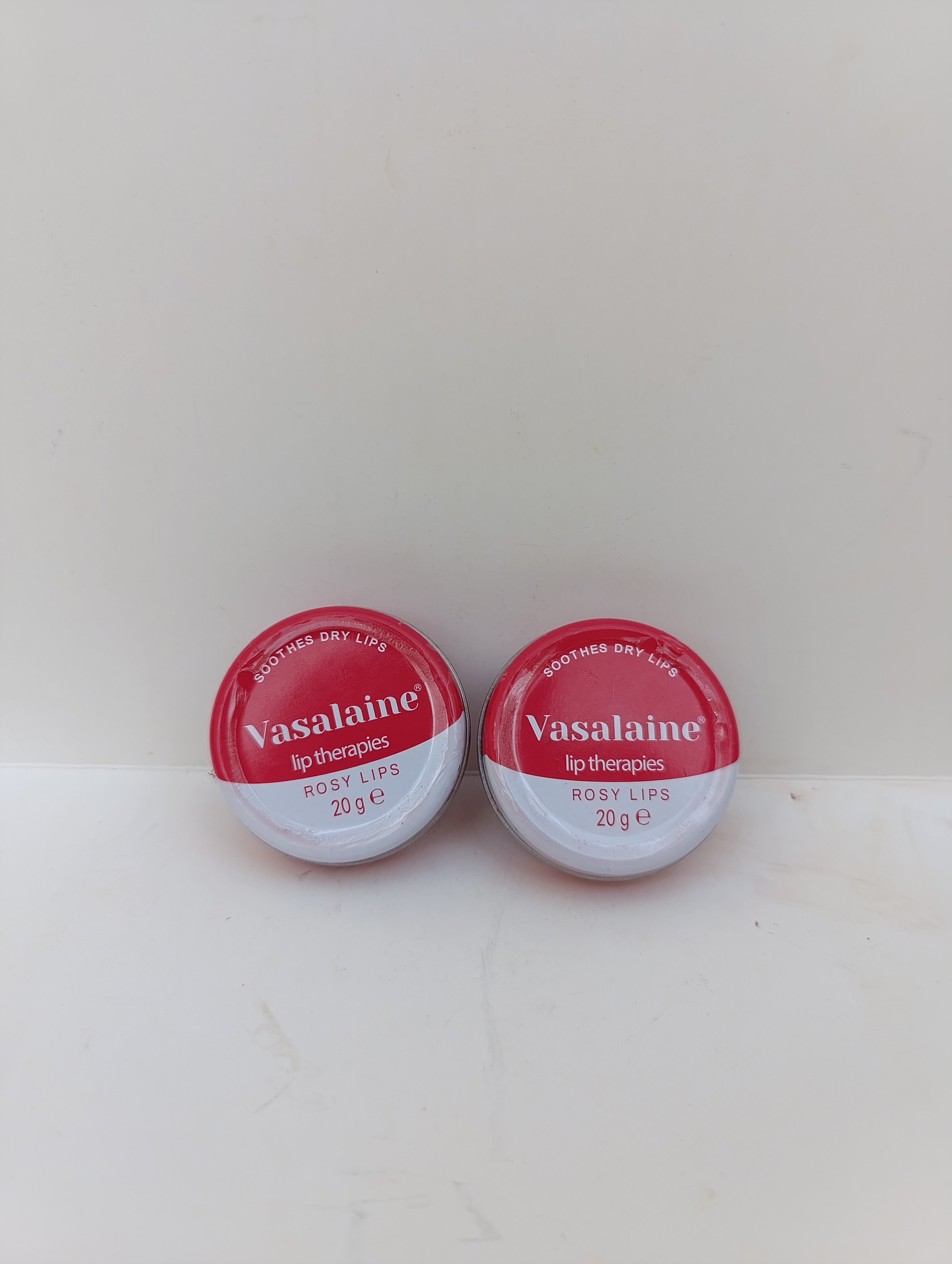 بالم لب کاسه ای وازلین مدل رز(Vaseline)